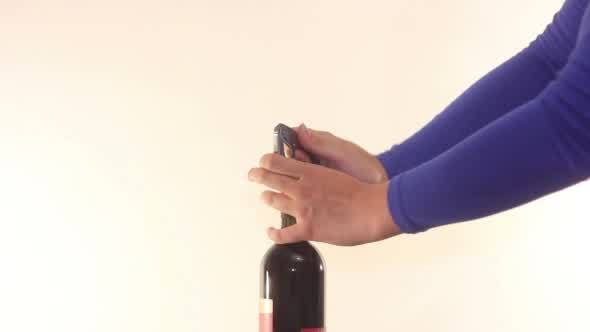 Opening Wine Bottle with Corkscrew