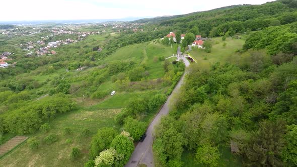Aerial View Of Houses In Forest Of Mount Medvednica By Zagreb, Croatia. alt