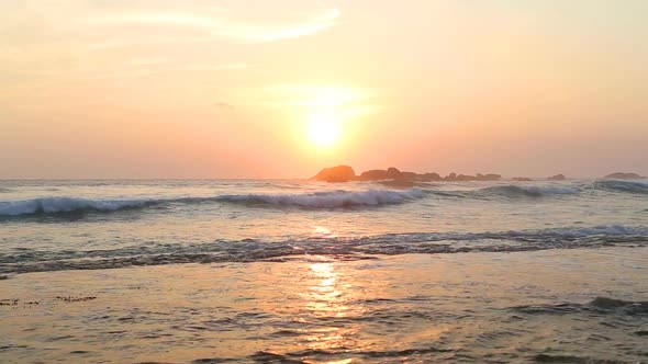 Ocean View In Hikkaduwa In Sunset With Waves Splashing The Beach. 9 alt