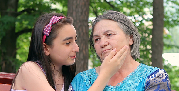 Sad Grandmother with Little Granddaughter alt