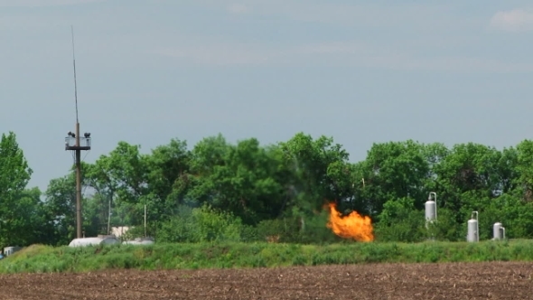 Natural Gas Flare Stack Burning In Oil Well 