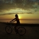 Girl On Bicycle At Sunset - VideoHive Item for Sale
