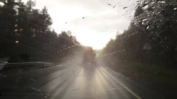 Driving the Car Through Heavy Rain Point of View
