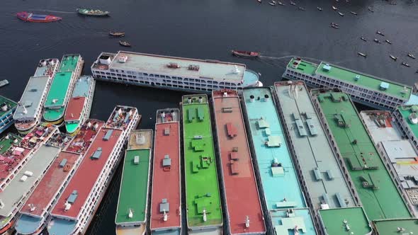Aerial view of a busy wharf along Buriganga river, Bangladesh. alt