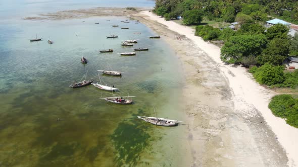 Boats in the Ocean Near the Coast of Zanzibar Tanzania Slow Motion alt