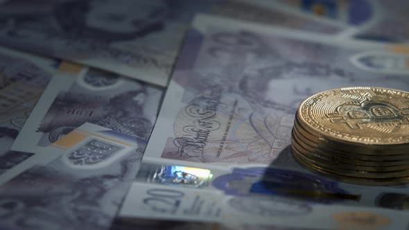 Bitcoin BTC Coin Rotating on Bills of 20 Pounds alt