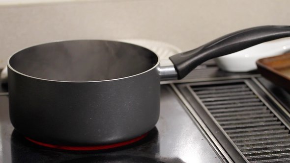 Steaming Pot on Stove Top