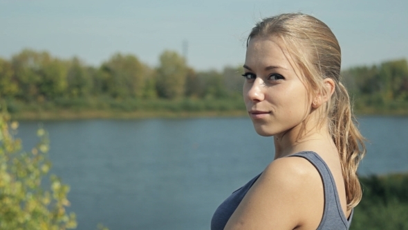 Beautiful Girl Looking At The Lake