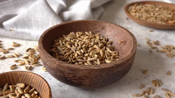 Raw rye seeds in a bowl alt