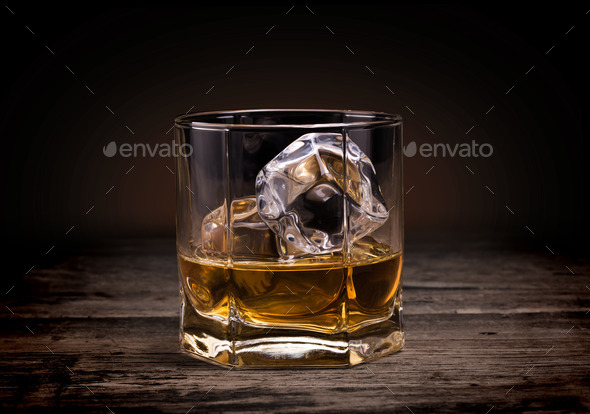 Glasses of whiskey on wood background. - Stock Photo - Images