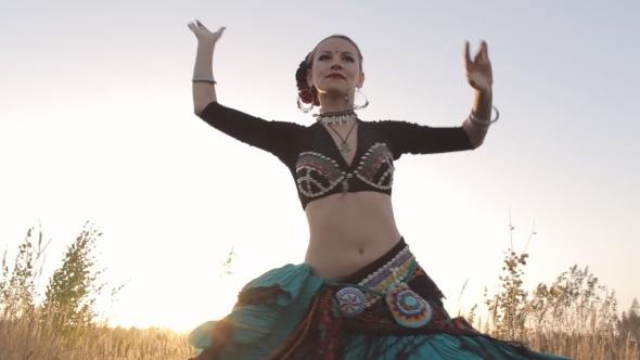 Girl Beautifully Dancing Belly Dance On The Nature