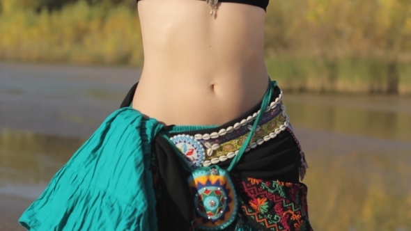 Girl Dancing Exotic Belly Dance On Nature