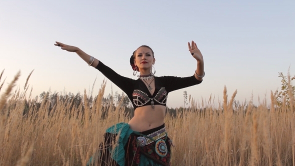 Beautiful  Girl Dancing Exotic Dance On Nature