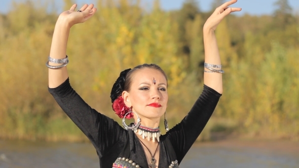 Beautiful  Girl Dancing Exotic Dance On Nature