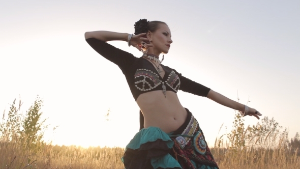 Beautiful  Girl Dancing Exotic Dance On Nature