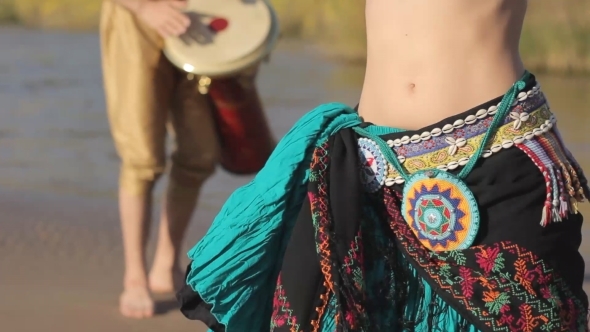 Beautiful  Girl Dancing Exotic Dance With Drummer