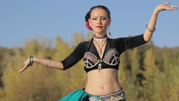 Beautiful  Girl Dancing Exotic Dance On Nature