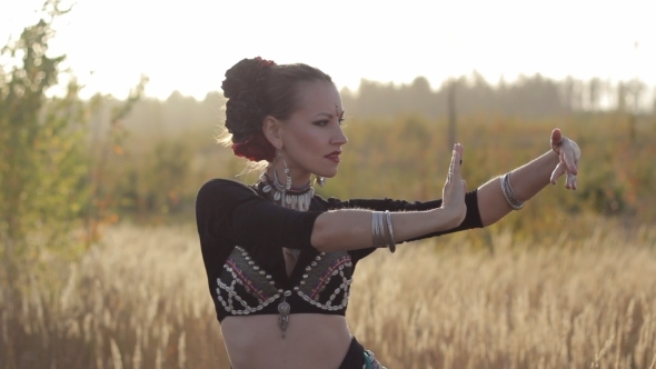 Beautiful  Girl Dancing Exotic Dance On Nature