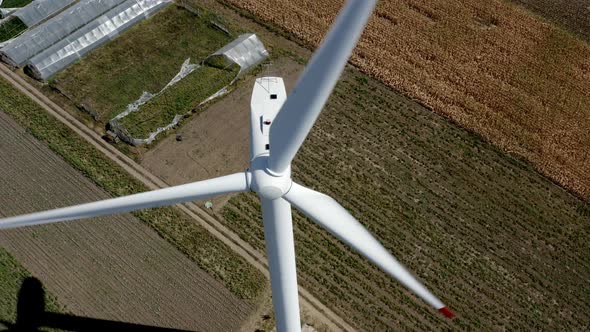 Windmill aerial view in 4K energy production wind power turbine