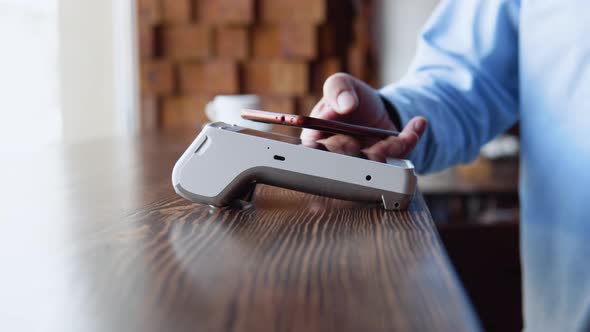 Emoney at Cashless Wallet of Male Client at Cafe alt