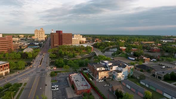 The Flint river cuts through the heart of downtown Flint, Michigan as captured from above by drone. alt