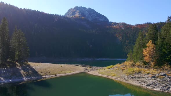 Aerial Shot of the Crno Jezero or the Black Lake in the Durmitor National Park in the Nothern Part alt