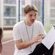 Sporty Coach Explaining Game Strategy to Primary School Children in Basketball Court - VideoHive Item for Sale