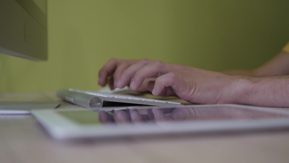 Thoughtful Young Businessman Working On Computer alt