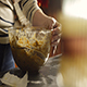 Woman Stirs Wet Cake Mix in a Glass Bowl - VideoHive Item for Sale