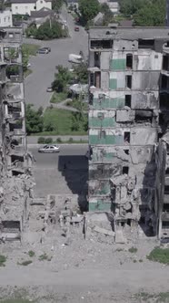 Vertical Video of a Destroyed Residential Building in Ukraine During the War alt