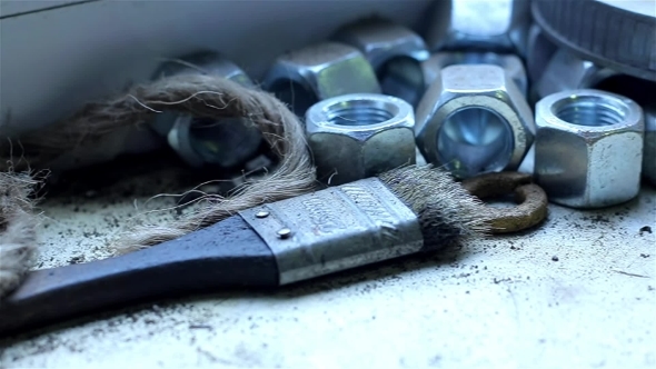 Wrenches And Bolts On Table