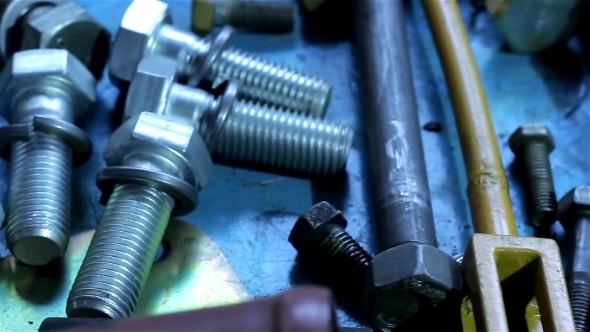 Wrenches And Bolts On Table Close Up