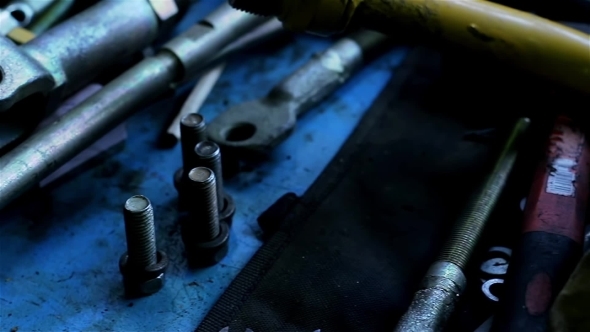 Wrenches And Bolts On Table Close Up