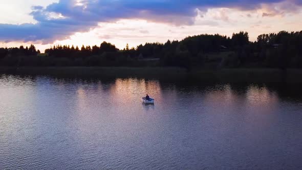 Man on Paddle Boat