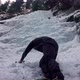 Climbing Frozen Ice. Hammer In Hand Crampons On Boots - VideoHive Item for Sale