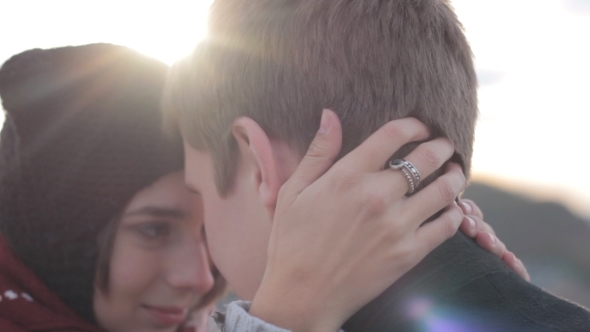 Lovely Young Couple Kissing In The Outdoors