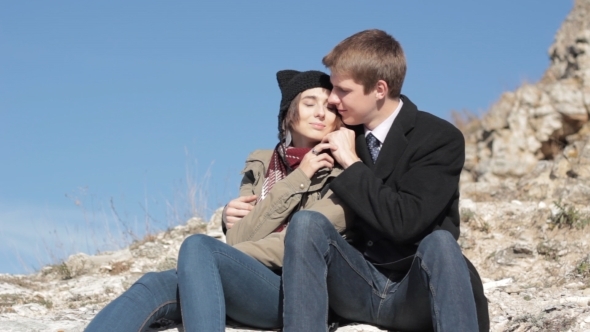 Lovely Young Couple Kissing In The Outdoors