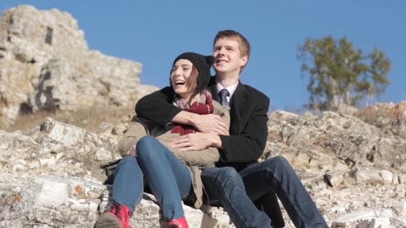 Young Couple Laughing Together Outdoors