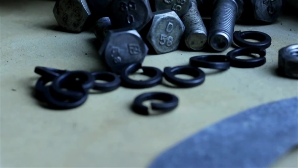 Wrenches And Bolts On Table