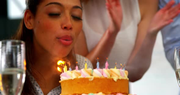 Business executive celebrating a birth day party in office alt