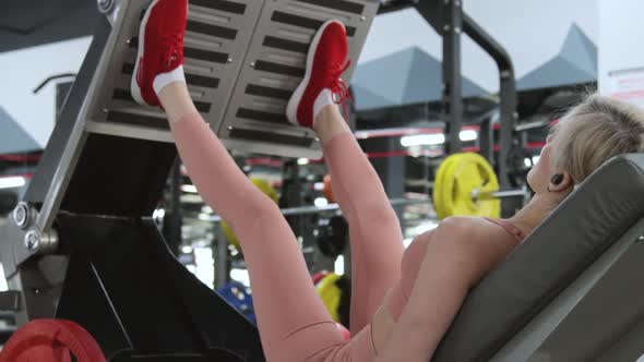 Young woman training in a sports club