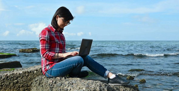 Woman In Red Shirt With Notebook
