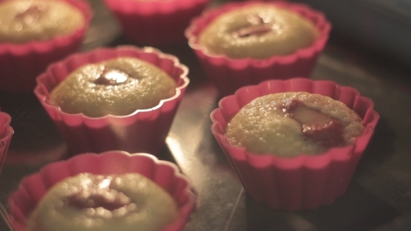 Muffins Baking In The Oven