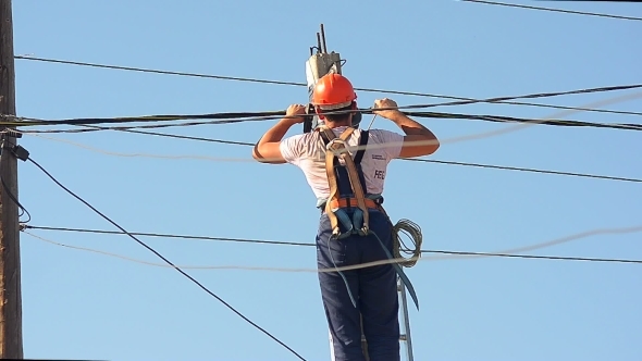 The Electrician On a Column alt