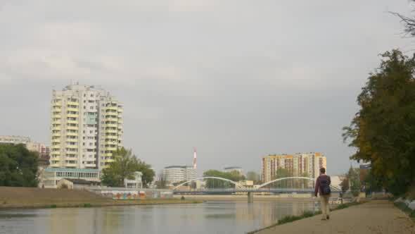 Man With Backpack is Walking Away by Asphalted alt