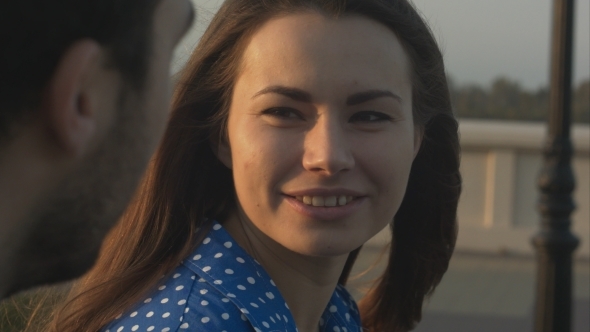 Woman Talks With Man.  alt