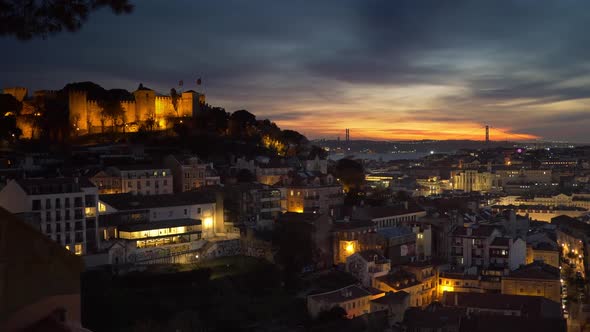 Sunset View of Lisbon Old Town, Portugal. Roofs of the City, Castelo De Sao Jorge and 25Th of April alt