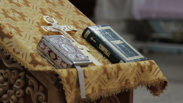 A Bible Lying On The Pulpit In a Church alt