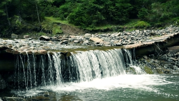 Mountain River With Small Waterfall alt