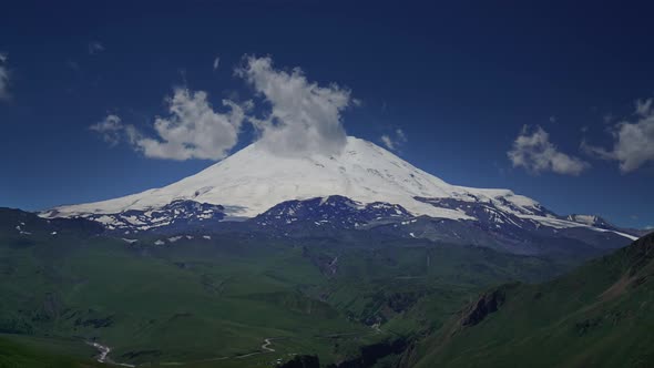 Mount Elbrus and Clouds Caucasus Mountains alt